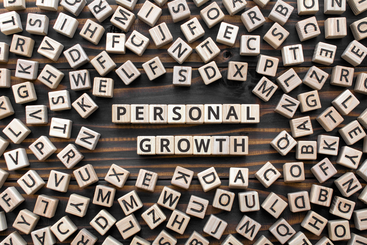 Personal growth - word from wooden blocks with letters
